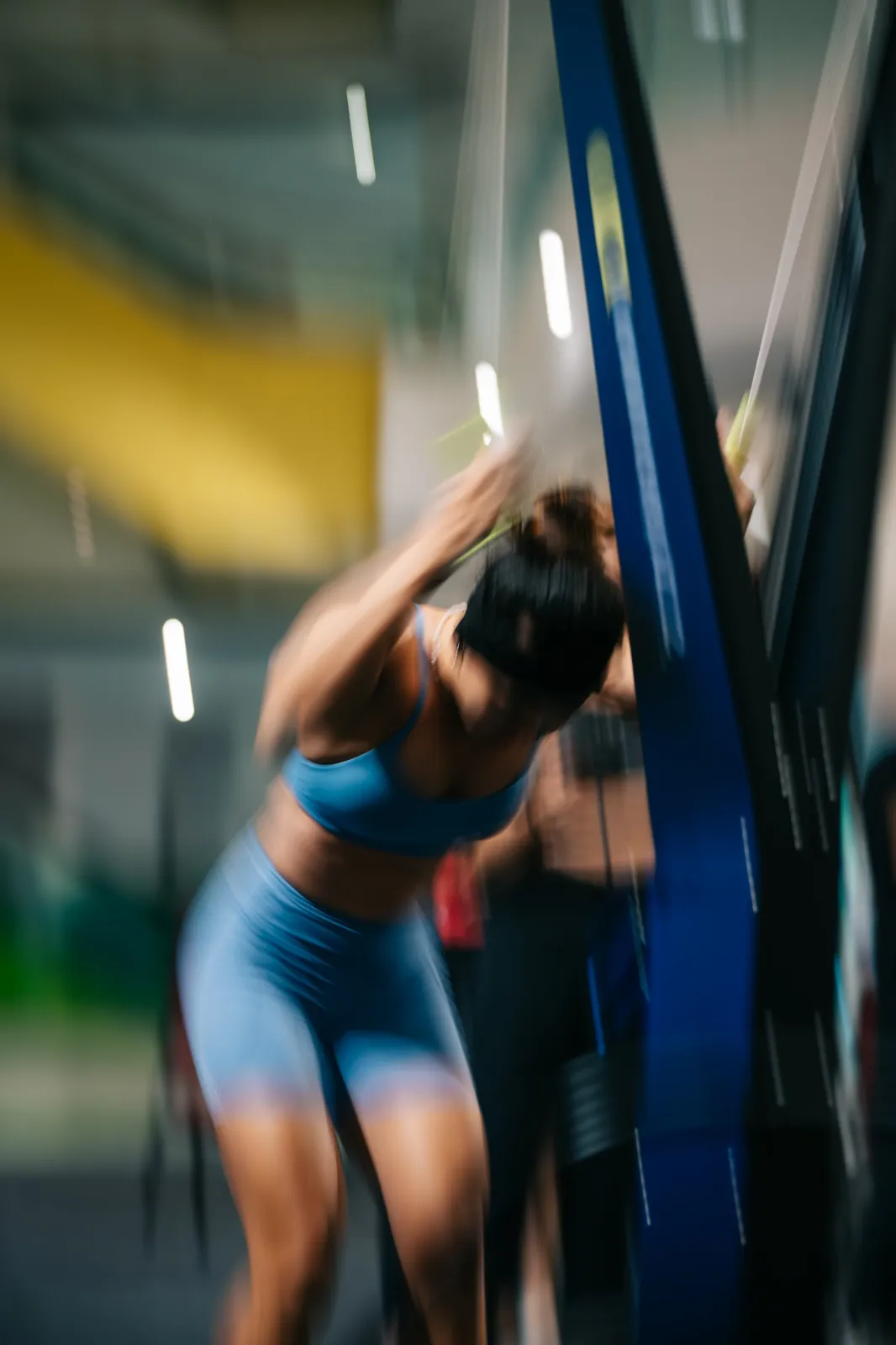 Motion blur of an athlete driving the SkiErg