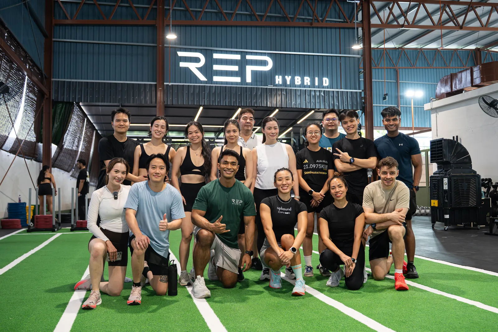 The 10am crew on the turf, thumbs up