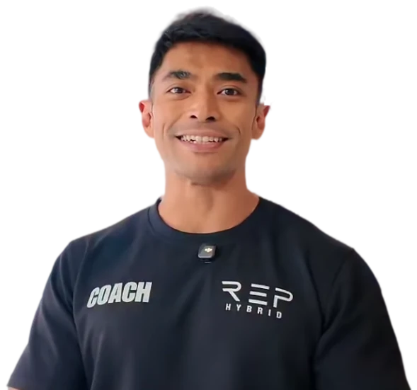 Riz, co-founder and head coach of REP HYBRID, in a REP coach t-shirt